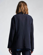 High Tech ASSURE
HIGH TECH
Men’s style jacket in navy pinstripe crêpe